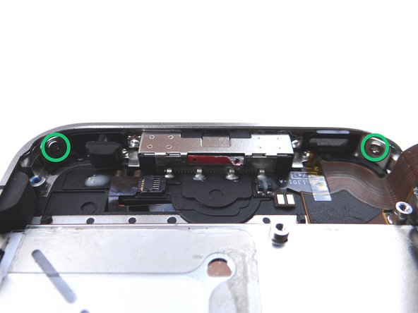 Remove two 1.5 mm Phillips screws from the bottom-left and bottom-right of the phone. Place in COMPARTMENT F.
