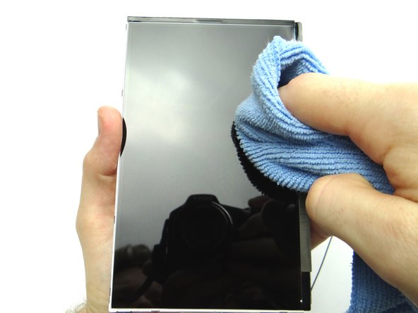 Check the LCD for fingerprints or particulates.  Clean with a chamois cloth and dust-off.