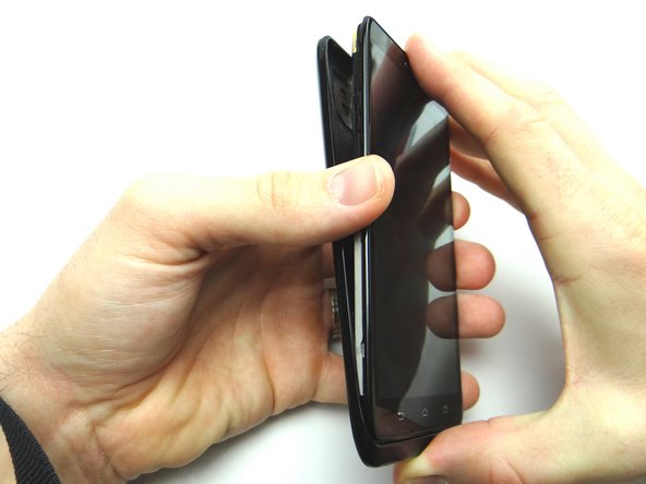 Push top of battery cover onto front panel.