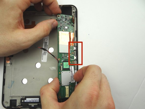 Picture 1: From ZONE V, guide the HDMI and charging port (red square) in first then continue to seat logic board.