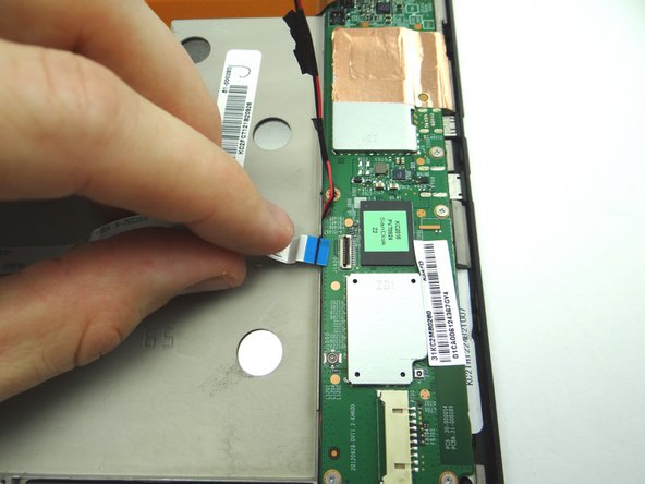 Picture 1: Remove headphone jack connection cable from open ZIF connector.