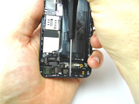 Stabilize the phone while you're replacing the screws by holding it as in Picture 2.