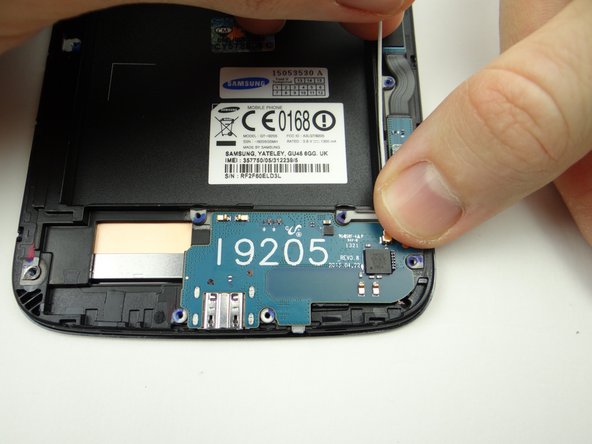 Picture 1: From ZONE II, seat lower end of the antenna cable on charging port board.