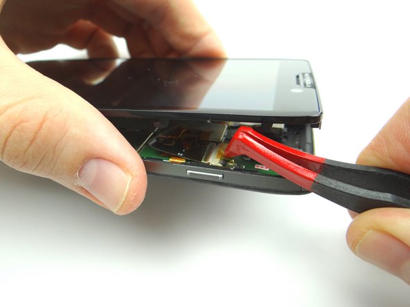 The component cable connector is next to the power button: peel up the yellow Kapton tape covering the connector.