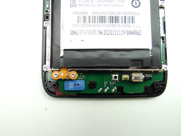 Picture 1: Replace two 3.3mm T5 Torx screws from SLOT 2.