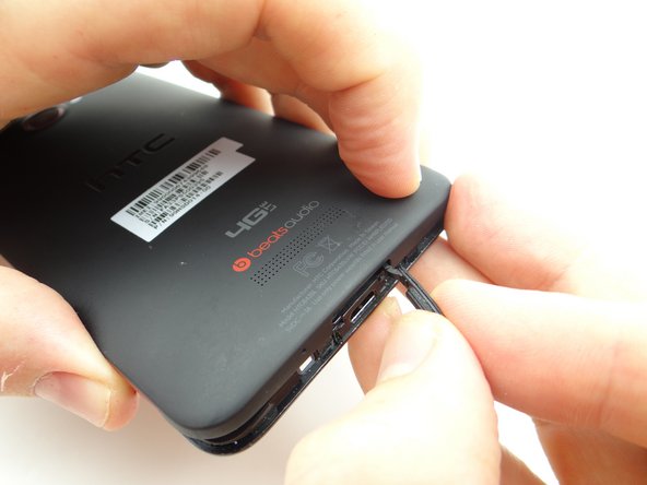 Picture 1: Replace charging port cover from COMPARTMENT B.