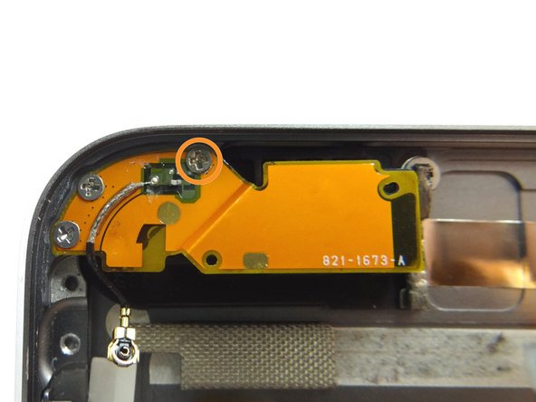 Remove one 1.5 mm Phillips #00 screw.  Place in SLOT 11.