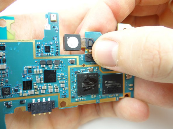 Seat rear camera on underside of logic board.