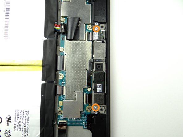 Remove two 2.7mm T5 Torx screws and place in SLOT 2.