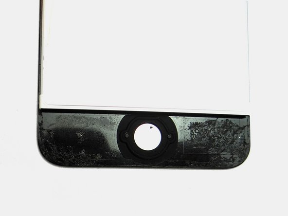 Clean adhesive from the screen.