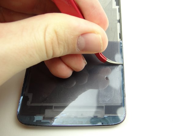 Picture 1: Cut the adhesive in half to make it easier to seat on the mid-frame.