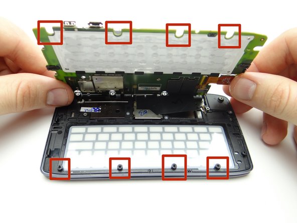 Picture 1: Line up the screw mounts with the openings on the logic board.
