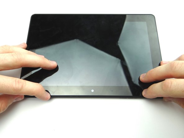 Picture 3: Press firmly on the display assembly to ensure all clips are seated correctly.