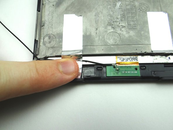 Picture 2: Fold tape down on top of antenna cable.