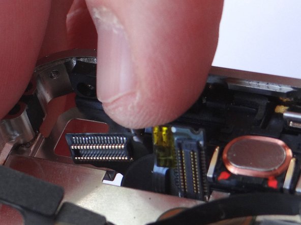 Pictures 2 and 3: guide the cables connected to the digitizer and LCD out through the slot on the mid-frame.