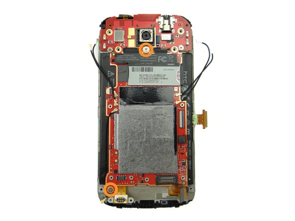 Picture 3: Remove two 2.6 mm Phillips #00 screws from the logic board.  Place them in SLOT 4.