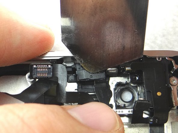 Use the iSesamo to gently pry the bracket covering the Sensor Cable. Place into COMPARTMENT E.