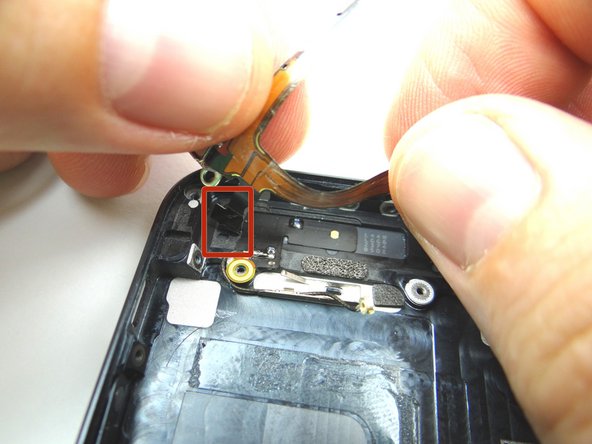 Picture 1:Take special care of the contacts that are attached to the ribbon cable in the top left corner.