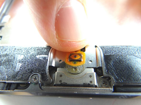 Seat the home button contact and cable.