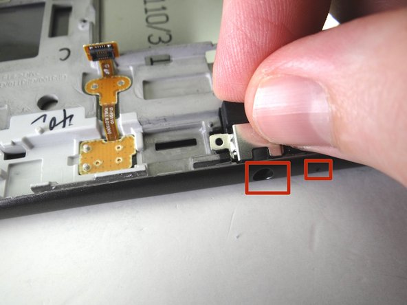 Picture 2: Seat headphone jack / microphone assembly on front panel.  Make sure the headphone jack and microphone are lined up with their openings on the front panel (red squares).