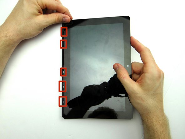 Align the clips (red squares) along the bottom of the display assembly with their slots on the rear case.