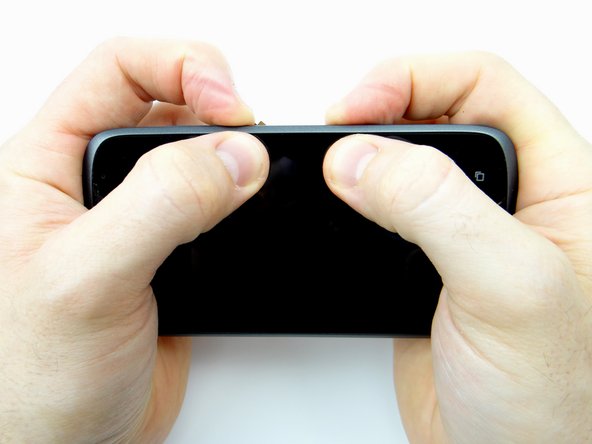 Snap either side of the front panel into the mid-body.