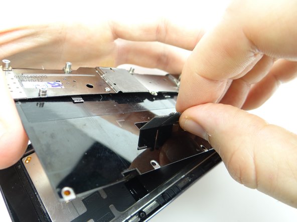 Feed display assembly cable through while seating metal plate.