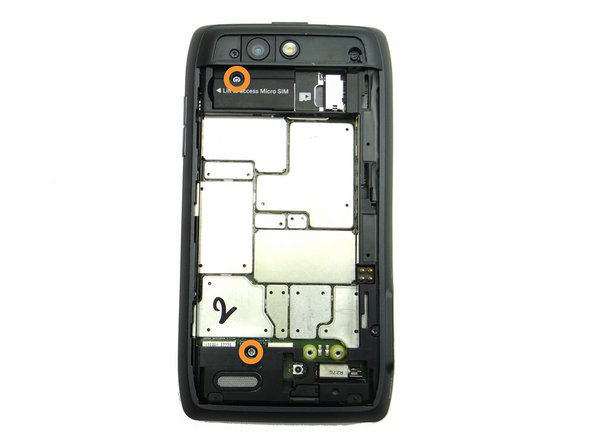 Picture 2: Remove two 4.3 mm silver T5 screws.  Place in SLOT 3.