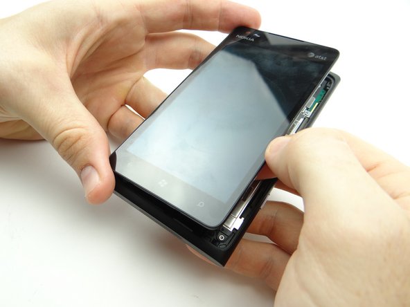 Continue lifting the screen slowly until it reaches a 90° angle.