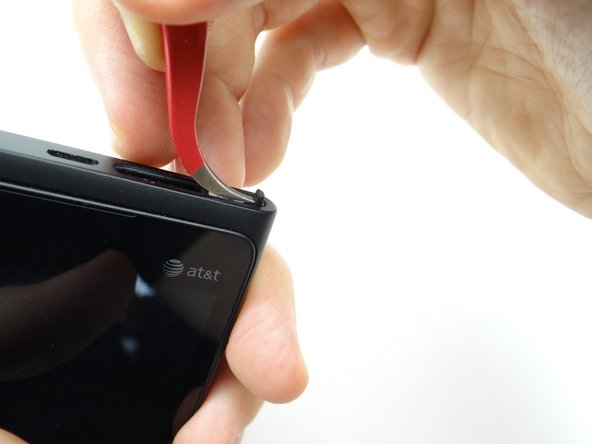 Pictures 1 &amp; 2: Use the curved tip tweezers to snag the tiny opening (red square in picture 2) on the screen locking pin.  Pull straight up until you can grab it with your fingers.