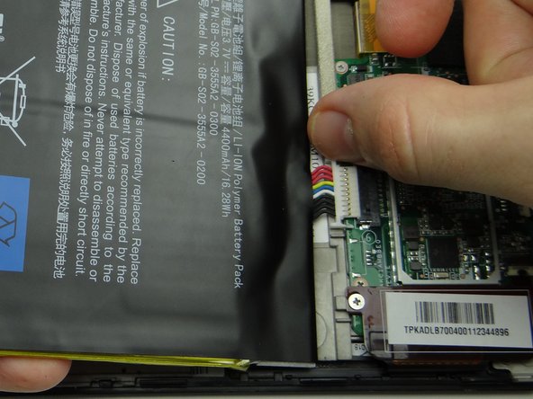 Picture 3: Make sure both sides are unhooked while pulling the battery up and away from the Kindle.  Place the battery in ZONE V with the battery cover.