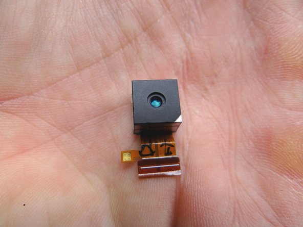 Place the rear camera in COMPARTMENT E with antenna bracket.