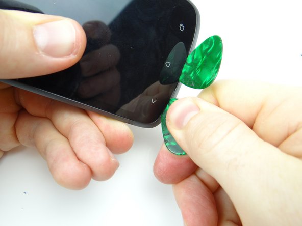 Picture 2: Wedge a second guitar pick directly under the escape soft key.