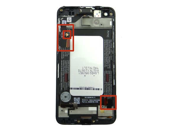 Make sure the LCD, volume rocker, and digitizer cables aren't trapped under the battery (red squares).