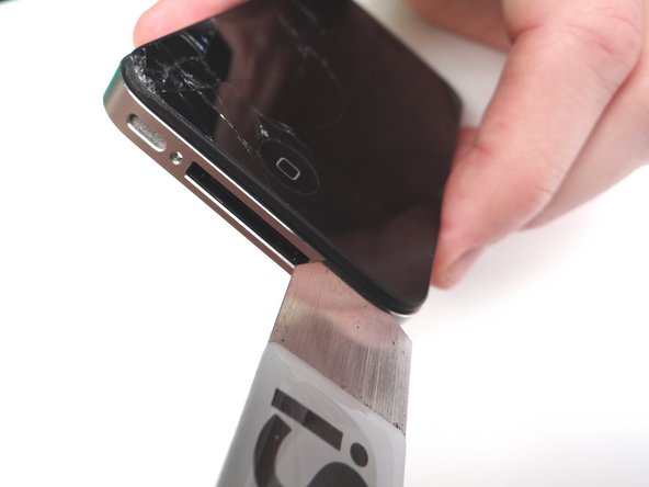 Perform the remainder of this step - and the next two steps - over a sheet of paper to collect shards of broken glass: