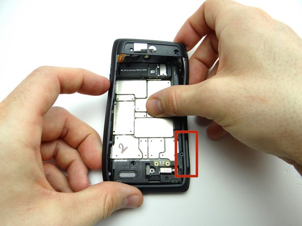 Continue peeling up the rear frame until you reach the HDMI and charging ports.