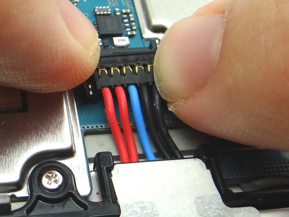 Push battery connector straight down into its socket.