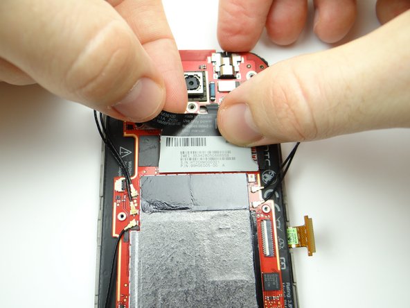 Retrieve the IMEI sticker from compartment D.  Seat the sticker as shown.