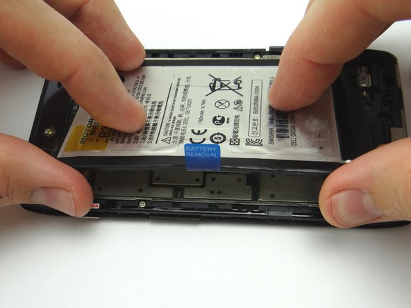 Picture 1: Retrieve battery from ZONE II. Place the battery into the metal chassis frame.