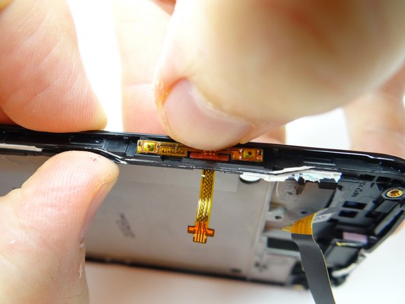 Feed the cable through the slot on the mid-frame, then seat it as shown in Picture 3.