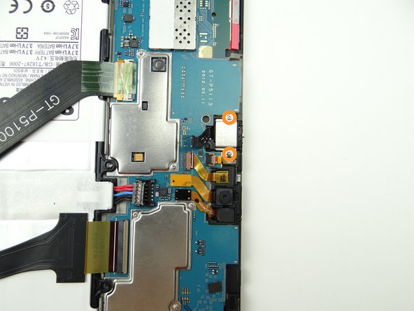 Remove two 3.0 mm #00 Phillips screws from the headset jack.  Place screws in SLOT 1.