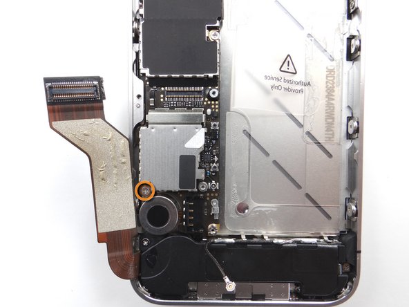 Picture 3: Replace the 2.5 mm Phillips screw near the vibrator motor from SLOT 12.