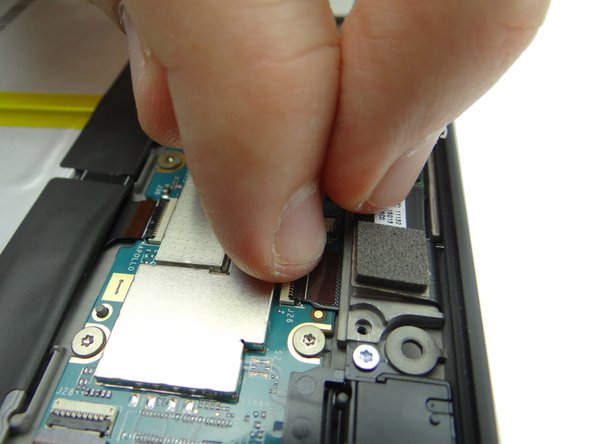 Close rear camera cable ZIF connector.