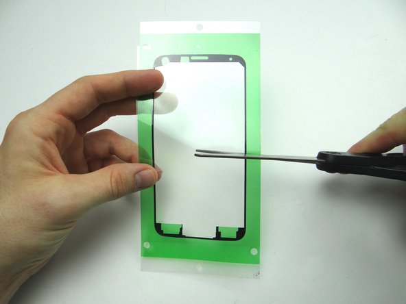 Cut adhesive in half so you can lay the top and bottom separately.