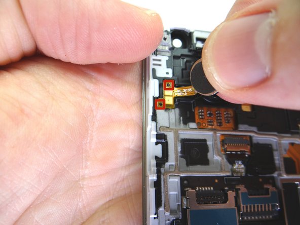 Line up two tabs in red squares first, then continue seating vibrator with your fingers.