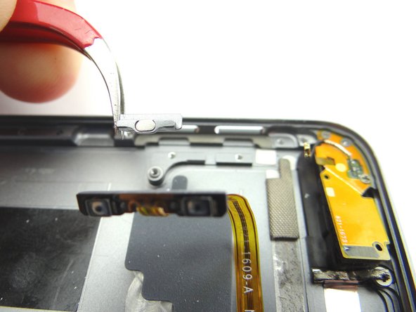 Use tweezers to remove volume buttons. Place in COMPARTMENT D.