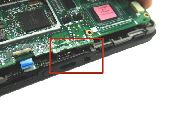 Picture 2: Shows the openings for the headset jack and charging port.