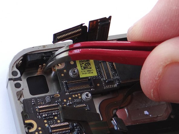 Use the Curved Tip Tweezers to replace the Gold Grounding Clip from SLOT 6.