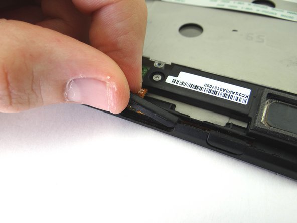 Gently lift volume rocker.  Place in COMPARTMENT A.