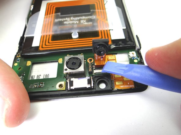 Close ZIF connector with blue pry tool.